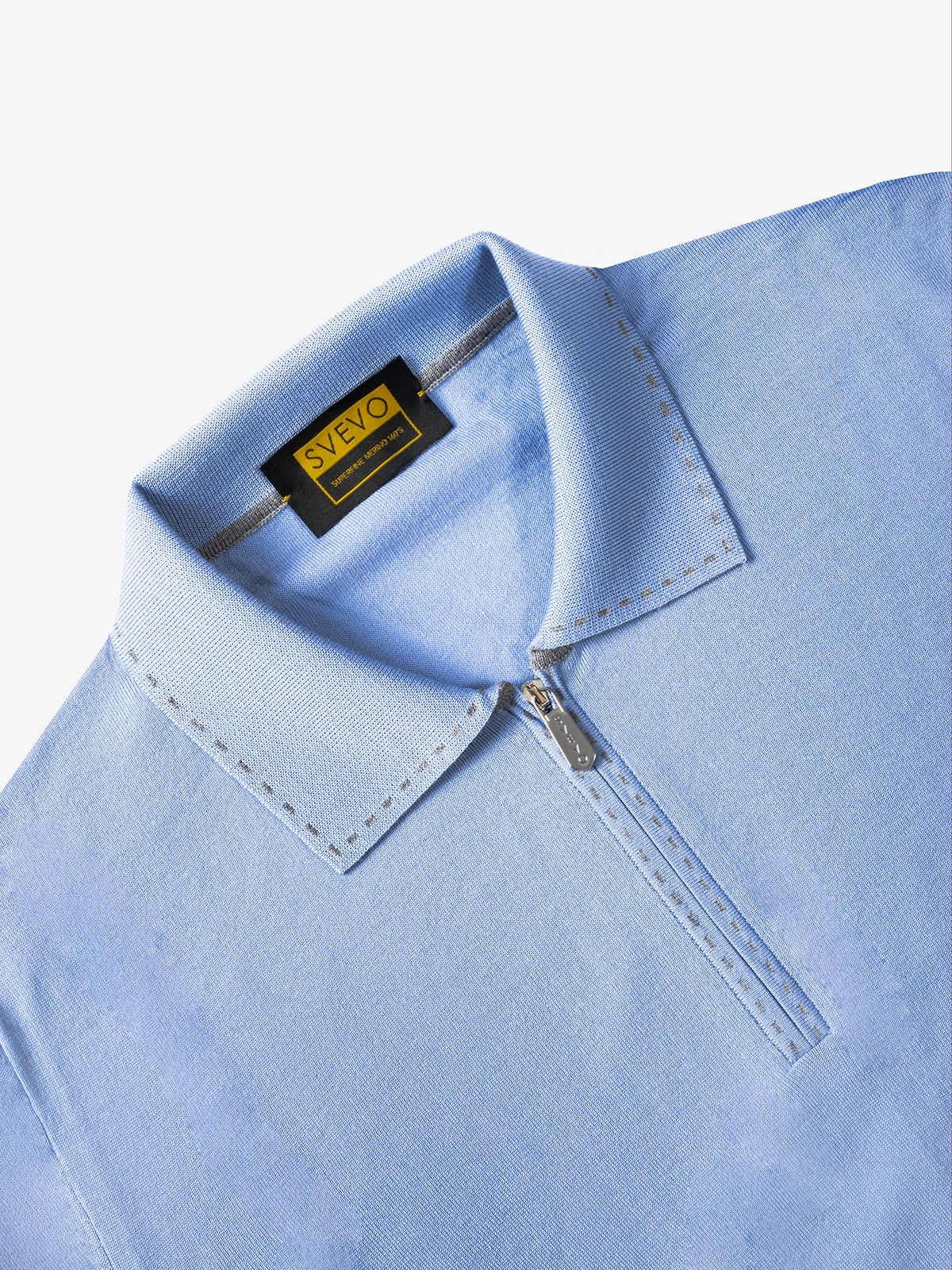Polo con zip e trattegi in 100% Lana azzurro | SVEVO